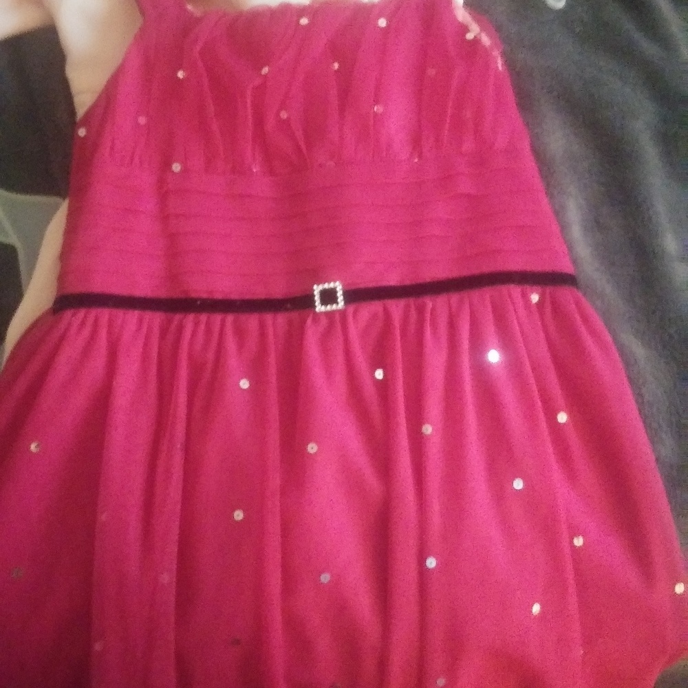 Girls pink sequence dress.